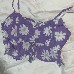 Here is a purple flower crop top from Tilly’s, but the brand is Full Tilt.
